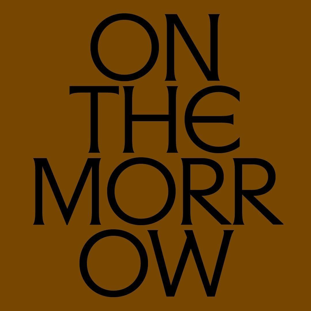 This is a stark, minimalist typographic design featuring the words 'ON THE MORROW' set in a bold, sans-serif typeface against a warm, earthy background. The design relies purely on the contrast between black text and the muted brown field to convey a sense of seriousness and timelessness.