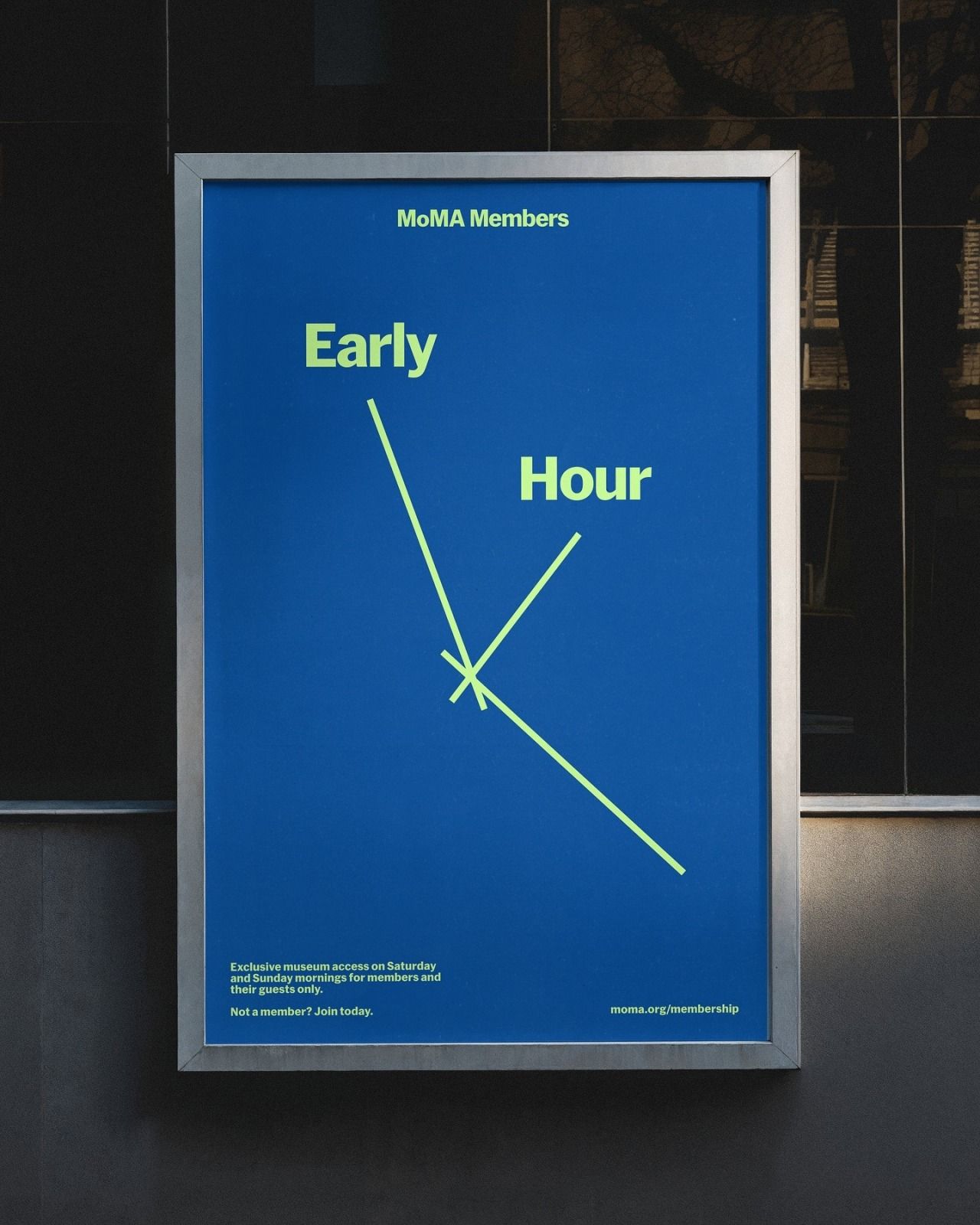 This is a clean, minimalist informational sign utilizing a strong blue field and a simple line drawing to convey time information. The design is highly functional, relying on negative space and clear graphic elements to communicate membership benefits.