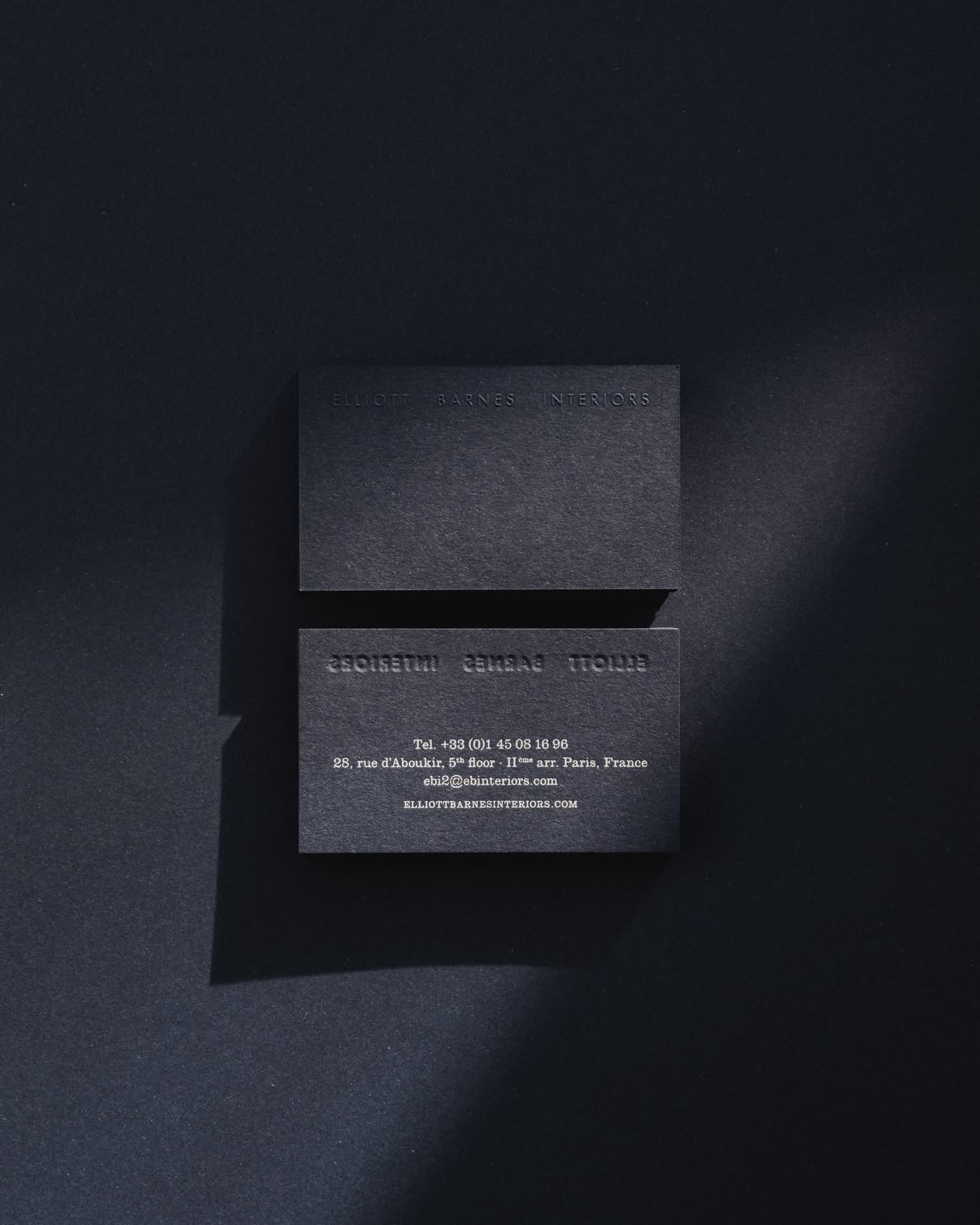 This is a minimalist and sophisticated presentation featuring stark, monochromatic blocks of texture and clean typography. The design relies heavily on negative space and precise alignment to convey a sense of luxury, seriousness, and modern elegance.
