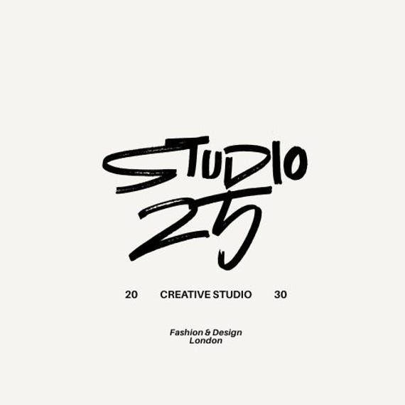 This is a minimalist, bold typographic logo featuring the word 'STUDIO' stacked above the number '25'. The design uses a hand-drawn or distressed brushstroke style, conveying a sense of raw creativity and established identity.