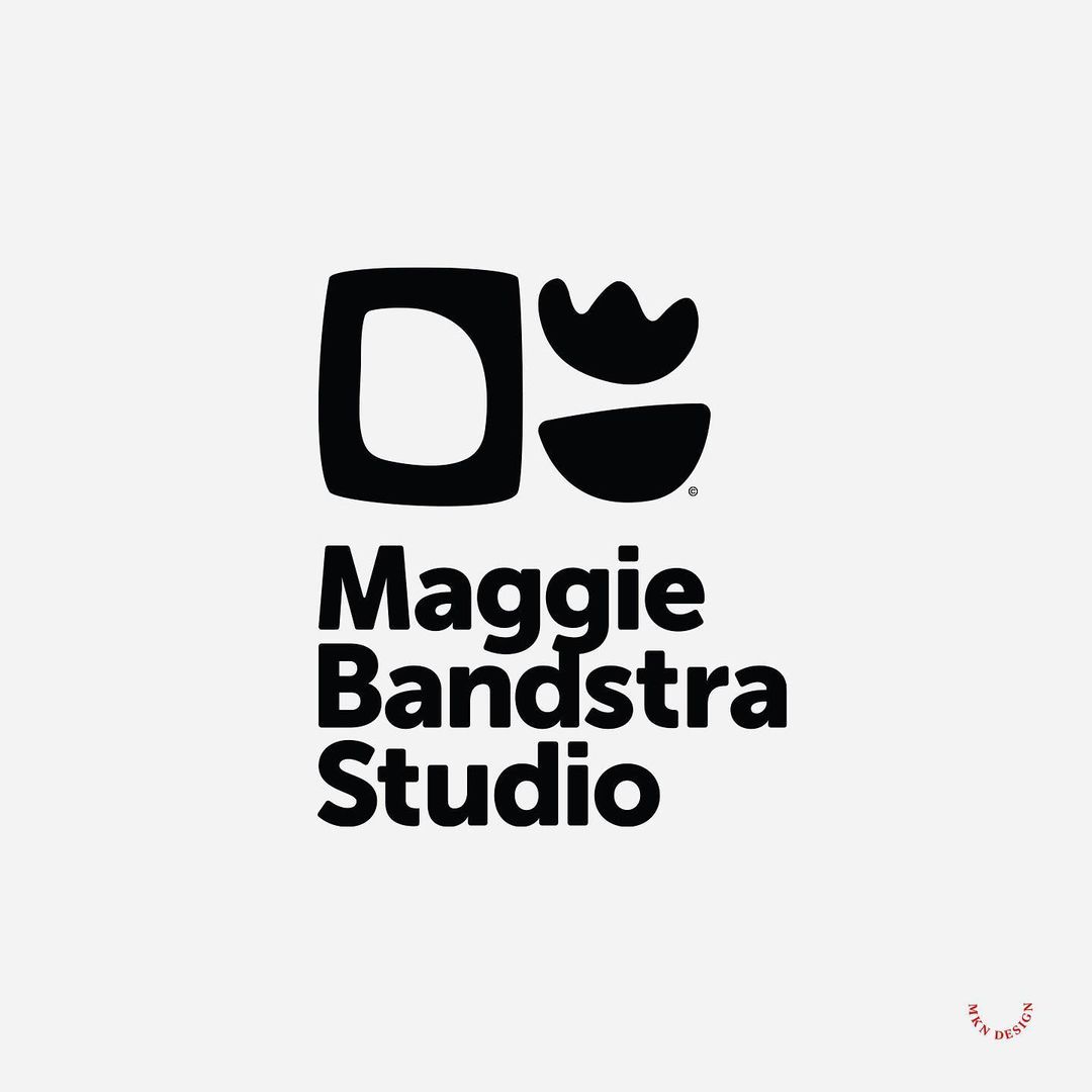The design is minimalist and modern, utilizing a stark black-and-white palette to create a clean, professional, and sophisticated aesthetic. The logo combines a geometric initial with an abstract, organic shape to suggest creativity and artistic endeavor.