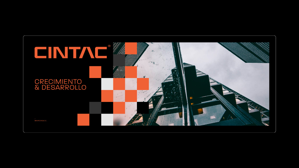 A modern, minimalist design for CINTAC featuring a bold geometric composition with a pixelated orange and white checkerboard pattern that transitions into an industrial architectural photograph. The layout balances clean typography on the left with a dynamic visual narrative on the right, creating a contemporary corporate aesthetic.