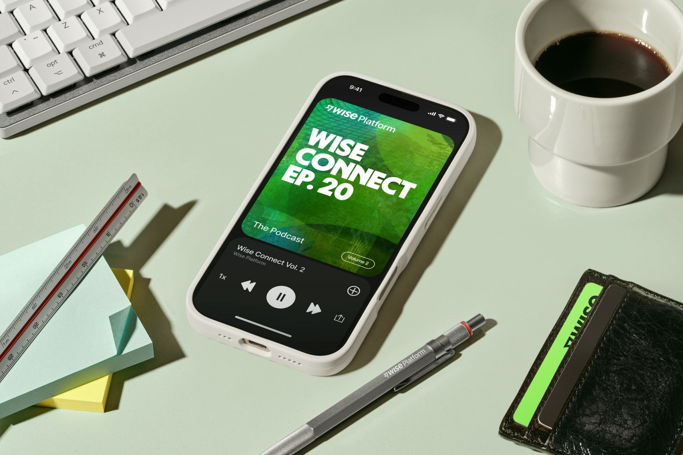 This image showcases a clean, minimalist product still life focusing on technology and media consumption. The visual language relies heavily on negative space, subtle textures, and a restrained color palette to create a sophisticated, professional, and calm atmosphere. The composition is balanced and intentional, emphasizing the tactile quality of modern tools.