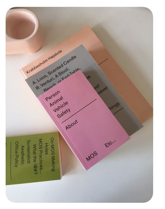 The image presents a minimalist and sophisticated arrangement of various cards or labels, suggesting a focus on detailed information presentation. The design relies on clean lines, muted tones, and a structured layout that emphasizes clarity and organization.