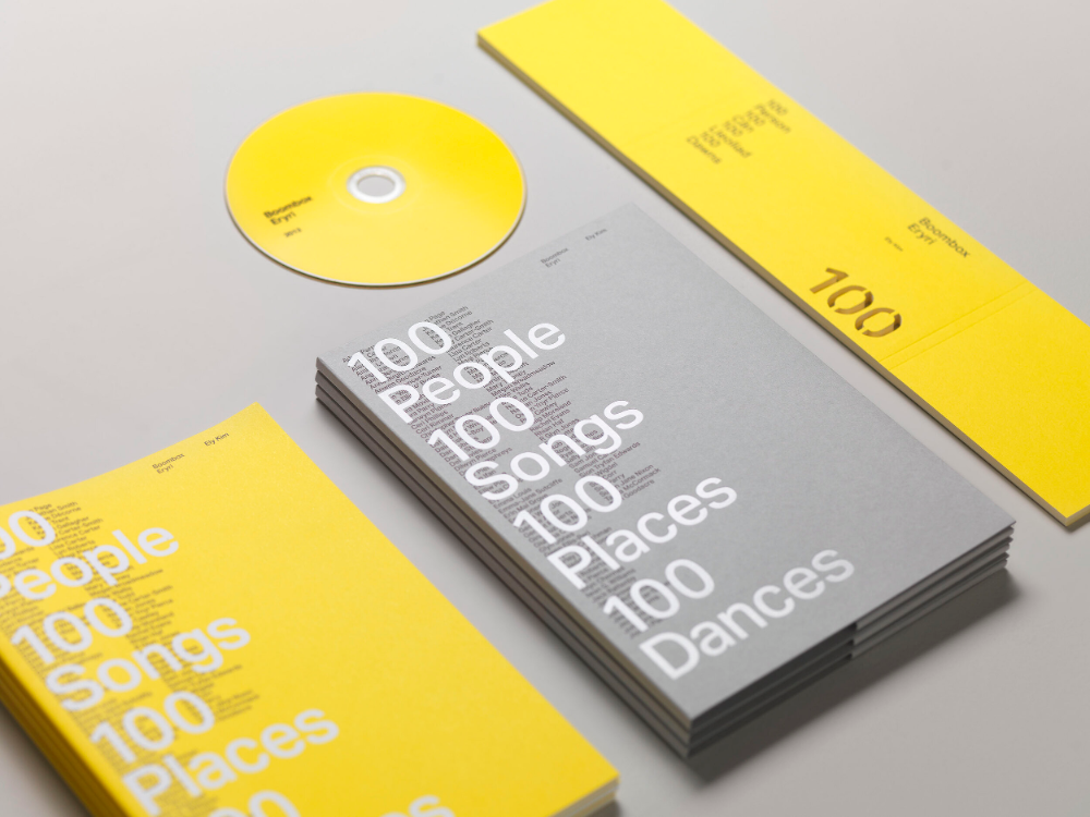 The image presents a clean, minimalist design focused on informational or collectible items, utilizing a high-contrast palette of bright yellow and muted gray. The composition is sharp and organized, emphasizing the numerical data and clear typography.