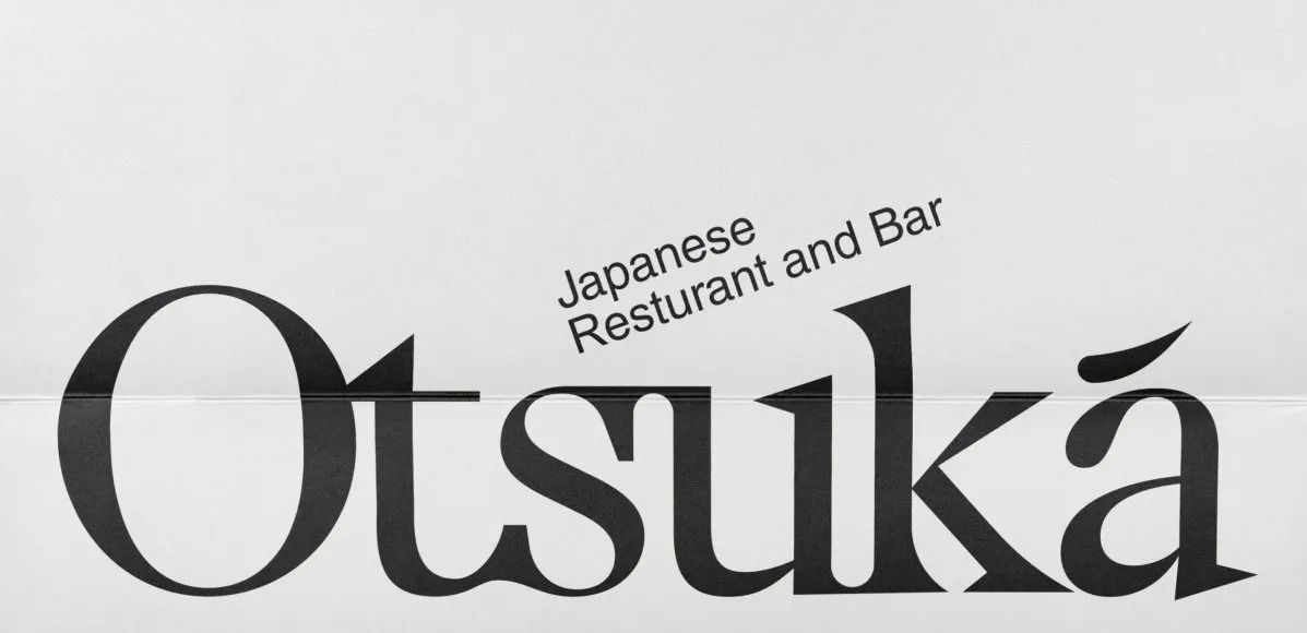 A minimalist logotype for a Japanese restaurant and bar featuring the word 'Otsuka' in a sophisticated serif typeface with elegant proportions. The design combines modern typography with subtle Japanese cultural references, using a restrained black-and-white palette that conveys upscale dining and authenticity.