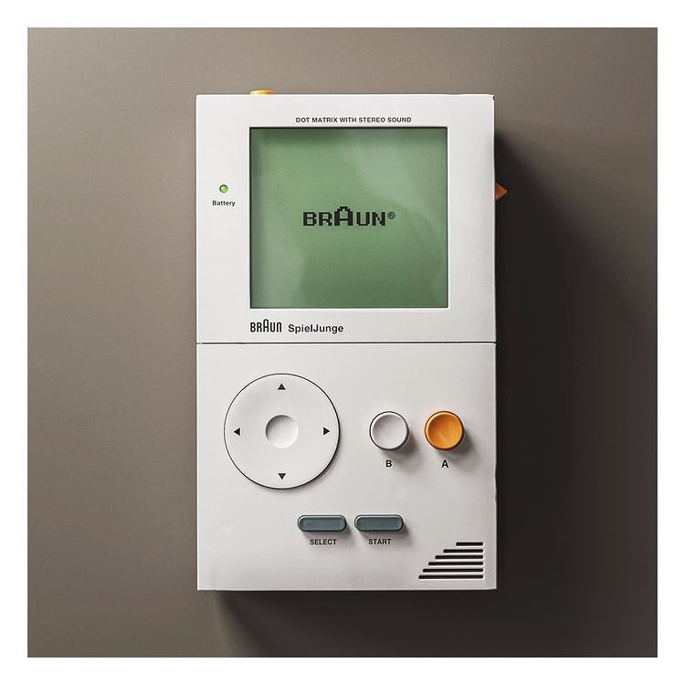 This is a vintage electronic device, likely a music player or synthesizer, characterized by a clean, functional, and minimalist design typical of mid-century audio equipment. The visual language relies on simple geometric shapes and a monochromatic palette to convey reliability and analog warmth.