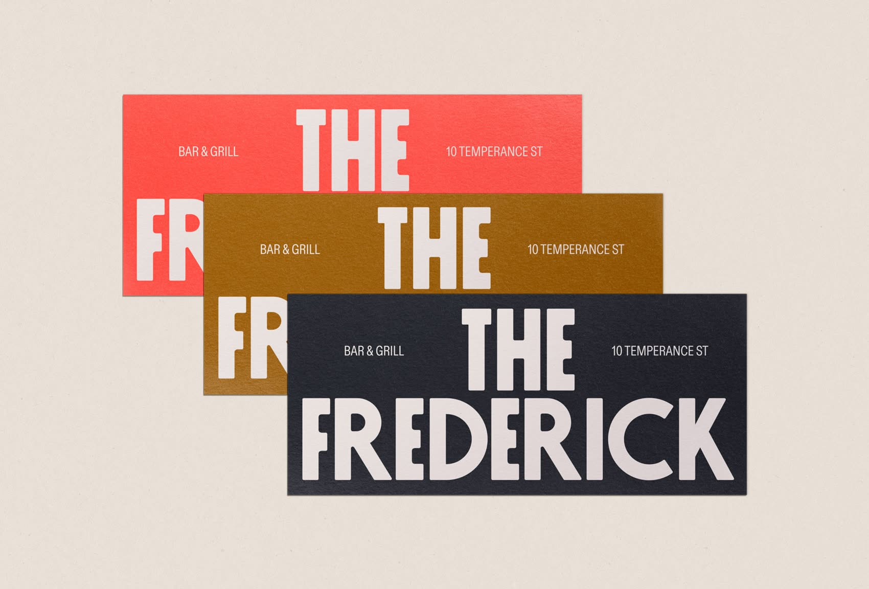 This design utilizes a bold, layered typographic approach, stacking distinct color blocks to create visual depth and hierarchy. The design balances warm, earthy tones with strong charcoal accents, resulting in a modern yet grounded aesthetic.