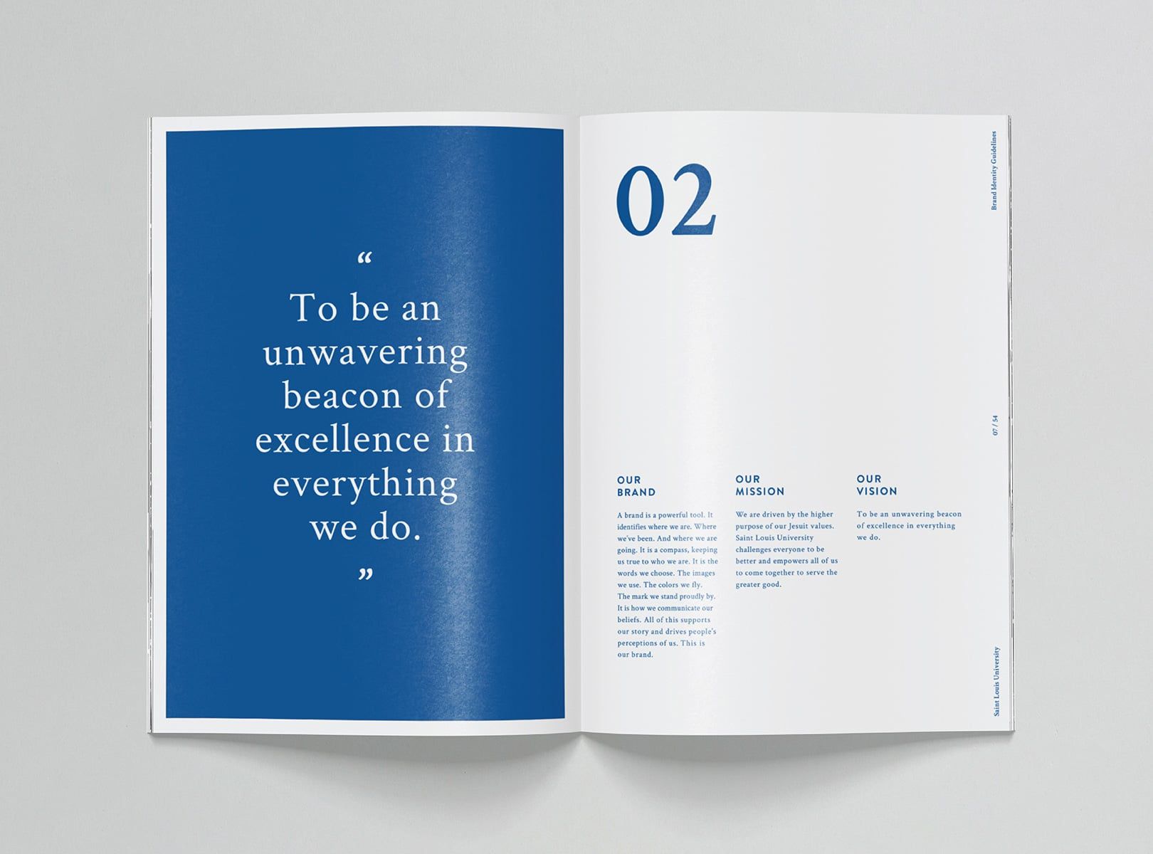 This design utilizes a strong contrast between deep blue and stark white to convey professionalism and trust. The layout is clean and balanced, employing ample negative space on the right page to ensure readability and emphasize key textual information.