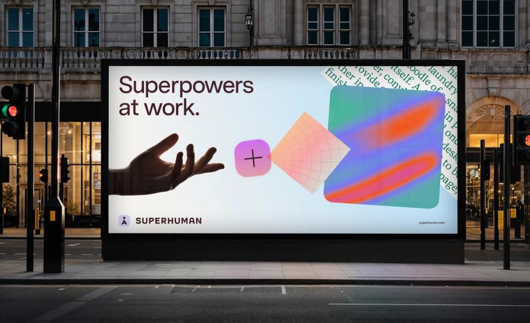 The image features a modern, large digital display showcasing an abstract representation of 'superpowers at work' using bright, geometric shapes and a hand gesture. The design is clean, contemporary, and uses vibrant color blocking to convey energy and capability.