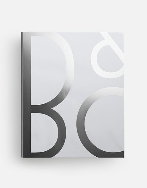 This design showcases a minimalist typographic study utilizing large, rounded sans-serif forms in a monochromatic scheme. The visual language is clean and architectural, relying on the interplay between solid shapes and subtle tonal variations to create depth. It conveys a sense of modern sophistication and structural clarity.