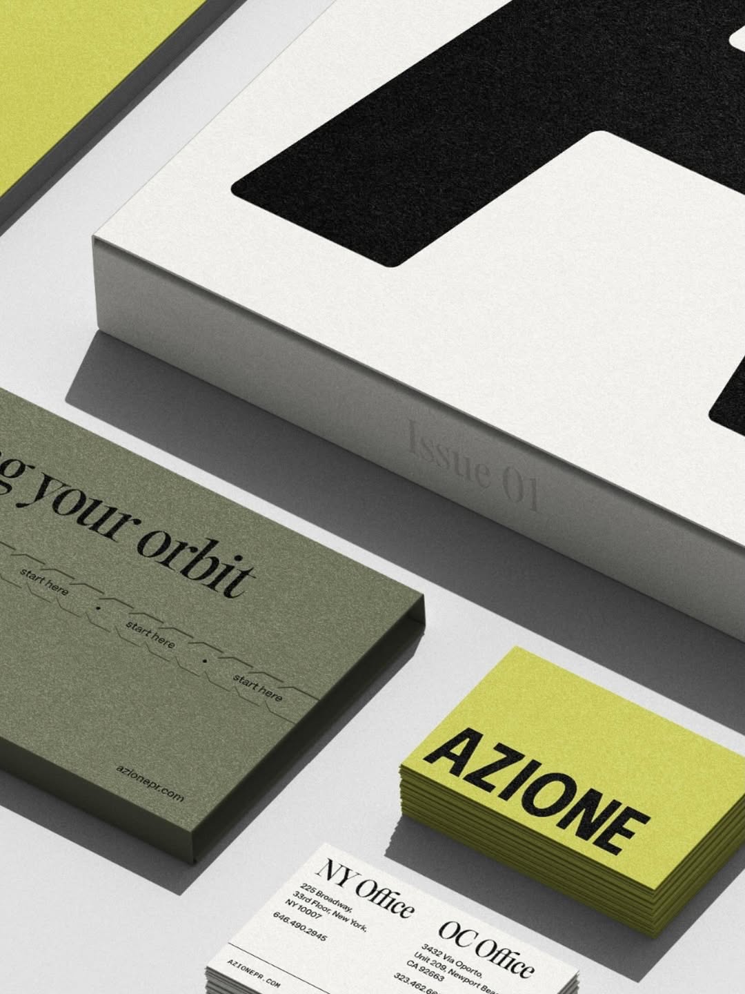 A contemporary branding and stationery design system featuring bold geometric shapes, minimalist typography, and a carefully curated color palette. The composition showcases multiple branded materials arranged in an isometric perspective, emphasizing modern design principles and professional identity work.