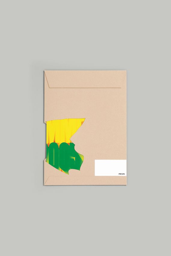 The design features a minimalist, tactile approach using muted earth tones contrasted sharply by a vibrant, organic splash of yellow-green. The composition is clean and direct, relying on the juxtaposition of solid color blocks against a neutral envelope background to create visual interest.