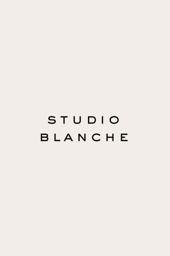 This is a minimalist and sophisticated logotype featuring the words 'STUDIO BLANCHE' set in clean, widely spaced, all-caps sans-serif typography. The design relies heavily on negative space and precise alignment to convey a sense of modern elegance and refined simplicity.
