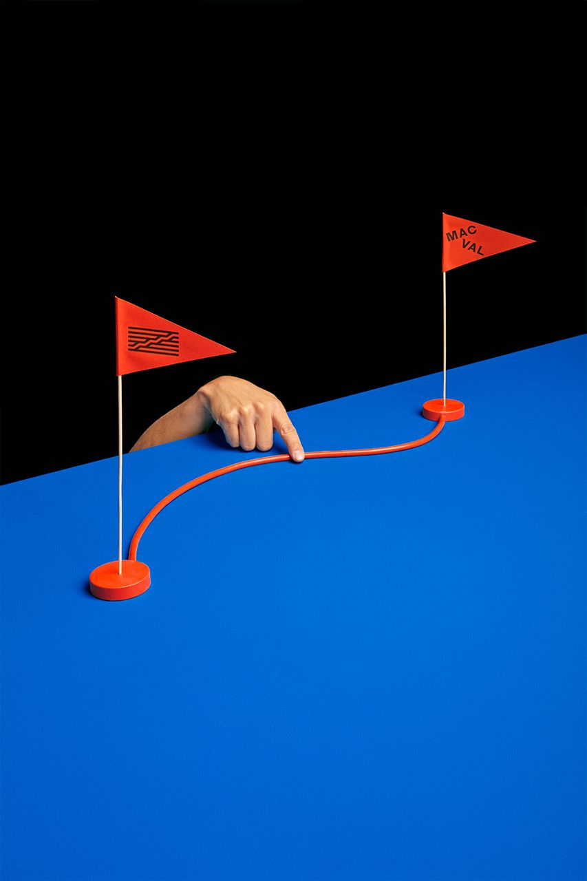 This image presents a minimalist, conceptual design focusing on the tension and connection between physical elements. The visual language is clean and direct, using simple geometric shapes to illustrate a concept, likely related to connection or achievement.