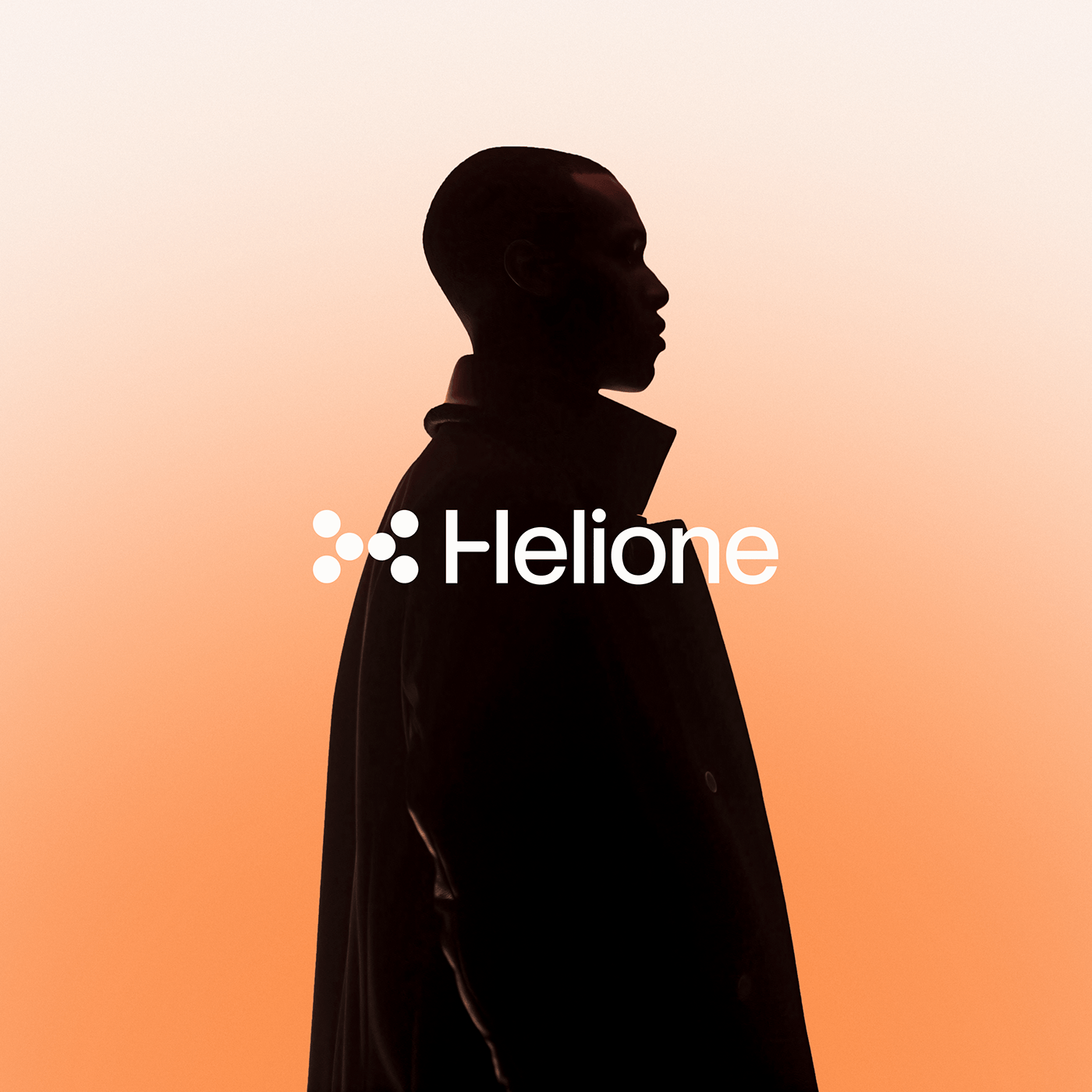 A minimalist silhouette design featuring a profile figure against a warm gradient background transitioning from cream to coral-orange. The composition uses high contrast between the dark figure and luminous backdrop, creating a striking visual hierarchy with the 'Helione' wordmark overlaid in clean, modern typography.