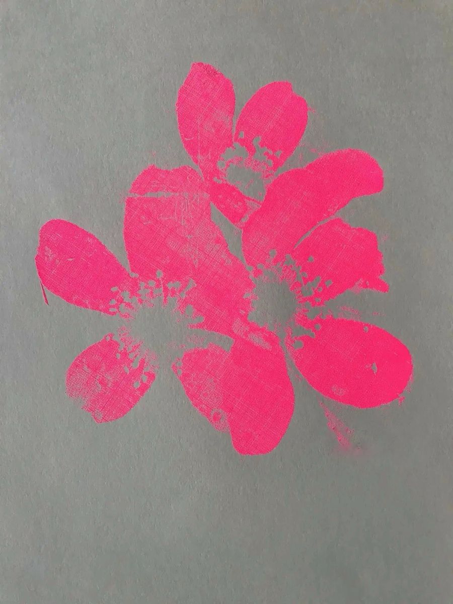 This is a vibrant, hand-drawn or digitally rendered abstract floral shape characterized by thick, textured strokes of bright pink. The design conveys a sense of organic movement and expressive, painterly texture against a muted background.