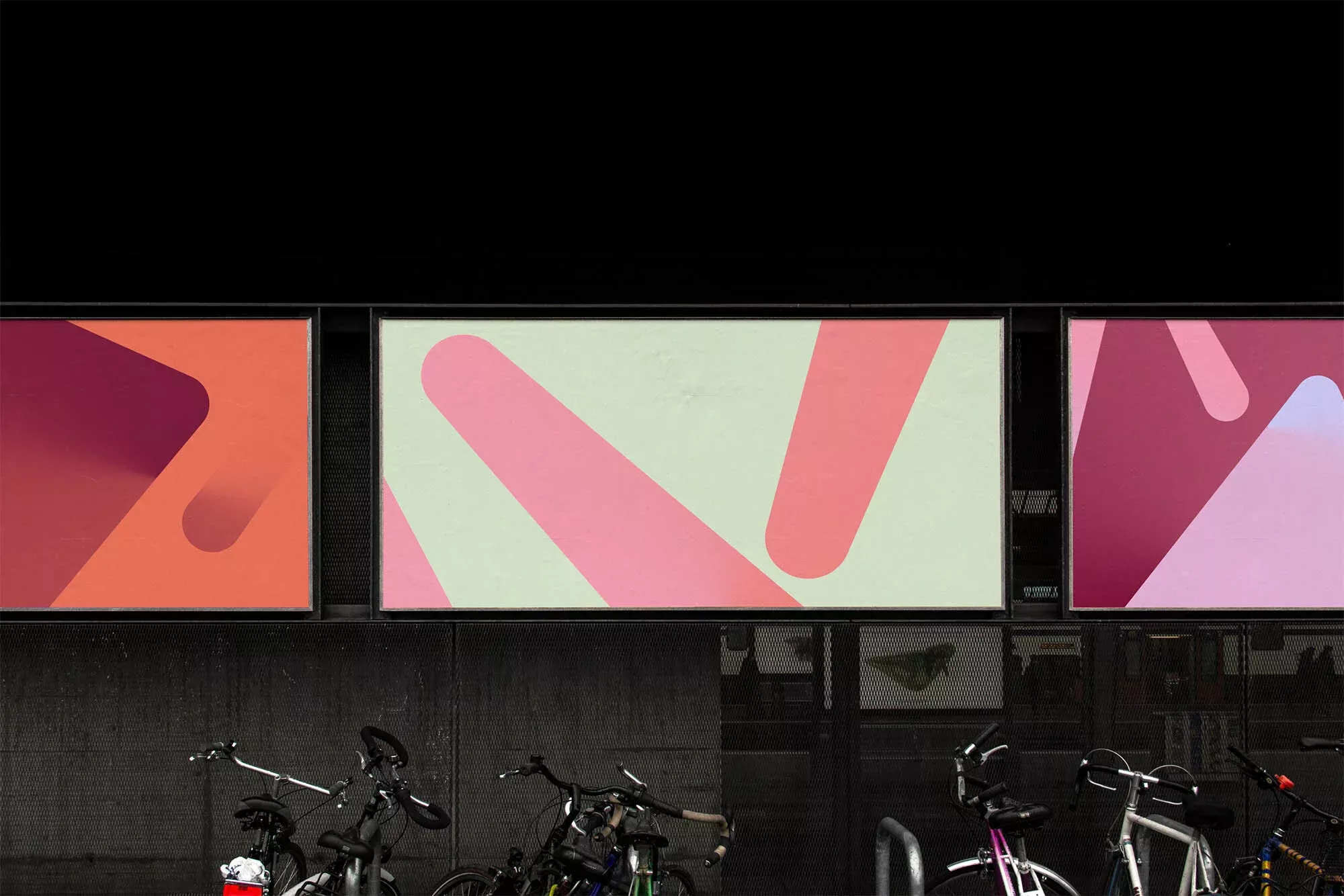 This image showcases a clean, modern display system where soft, abstract graphic designs are presented against a stark black architectural background. The visual language relies on minimalist composition, strong horizontal lines, and a subtle use of pastel tones to create sophistication.