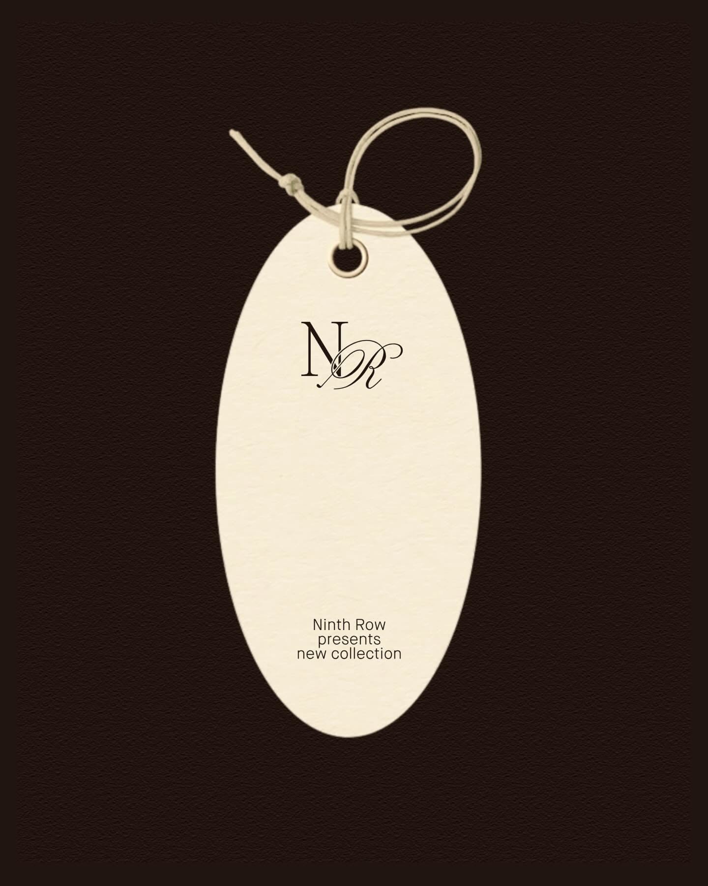 This is a minimalist and elegant product tag design featuring a cream-colored, oval shape against a dark brown background. The design relies on negative space and delicate line work to convey a sense of refined simplicity and artisanal quality.