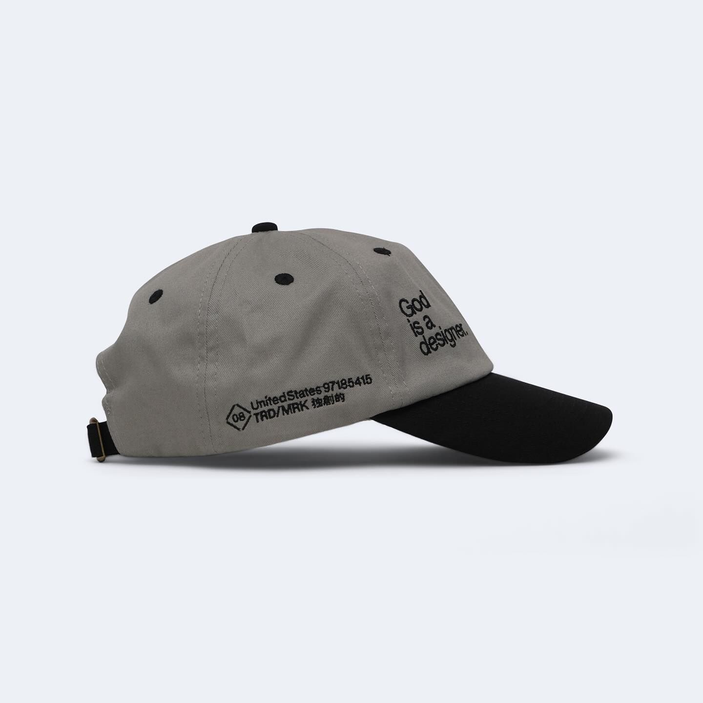 This image features a minimalist, unstructured cap design rendered in neutral tones, emphasizing clean lines and simple texture. The visual language is quiet and utilitarian, relying on subtle details like the embroidered text to convey a sense of brand or identity.