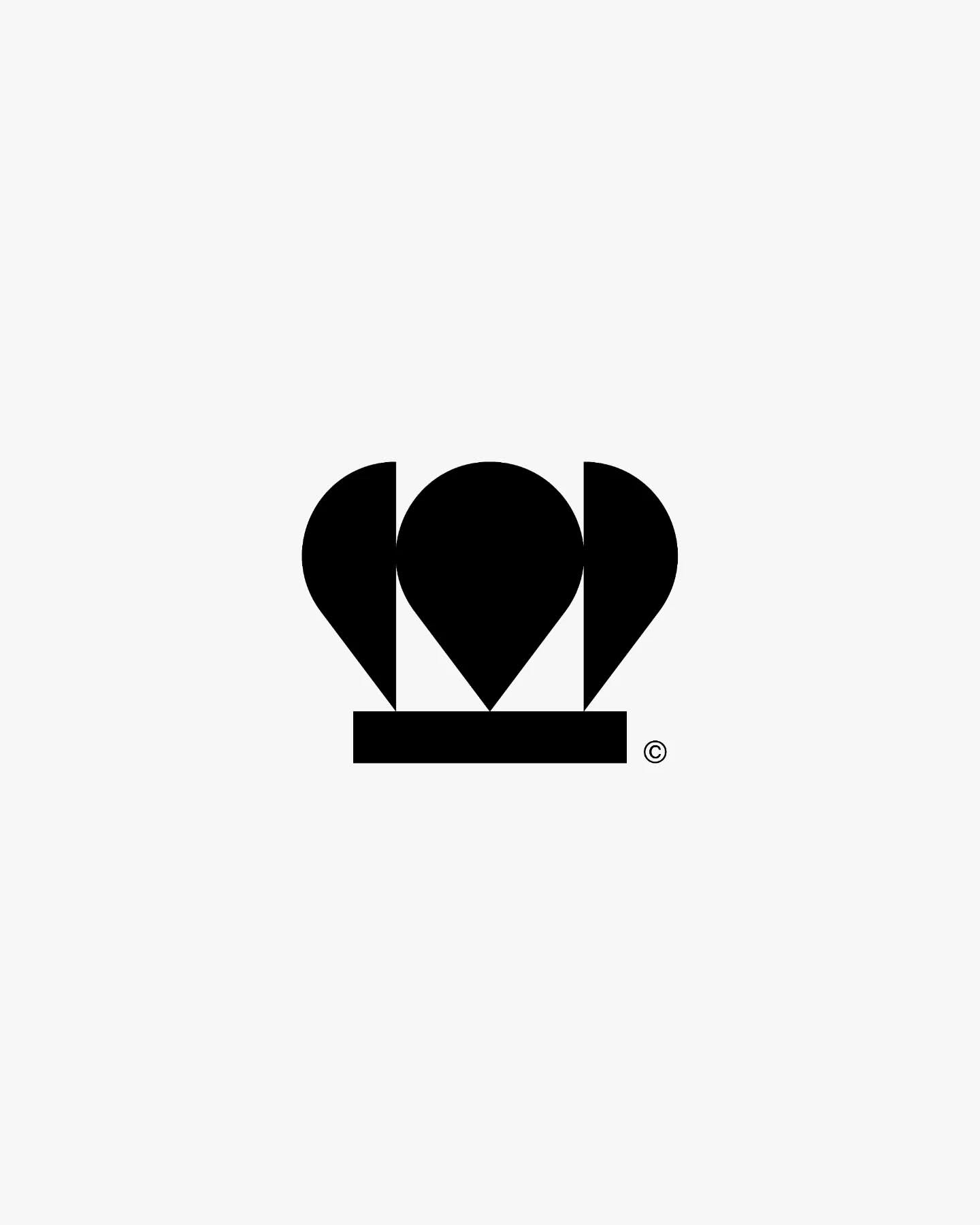 This is a highly minimalist, solid black icon representing a location marker or pin. The design relies purely on shape and negative space to convey its meaning, resulting in a clean and unambiguous visual statement.