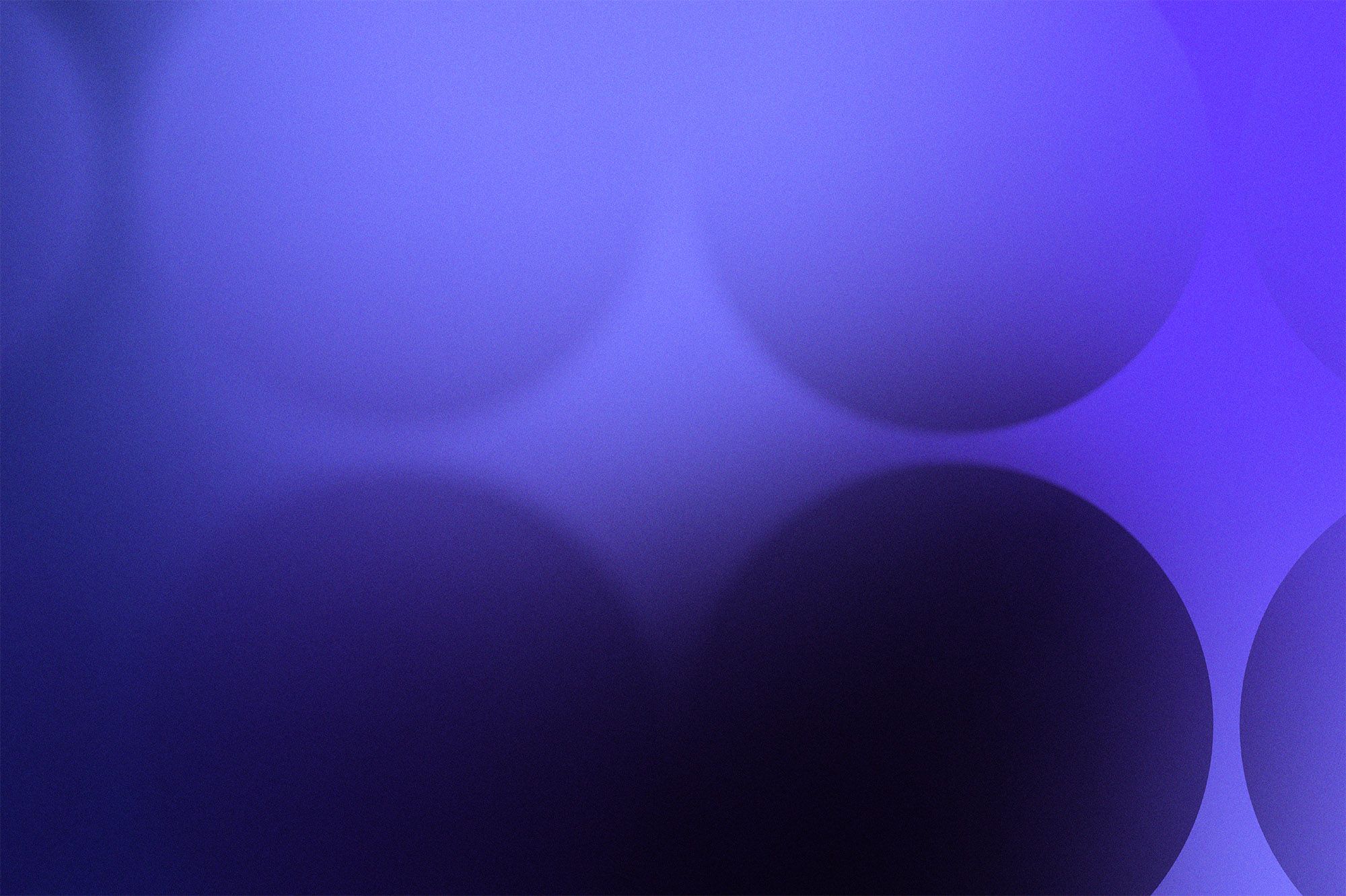 This image features a soft, abstract background composed of overlapping, blurred circles or bokeh effects. The visual language relies heavily on smooth gradients and subtle luminosity shifts to create a dreamy, atmospheric effect.