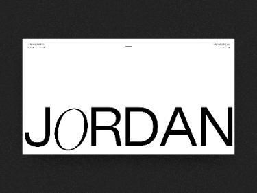 This is a minimalist and stark typographic design featuring the word 'JORDAN' in bold, sans-serif lettering against a pure white background. The design relies heavily on negative space and strong, clean lines to convey a sense of modern sophistication and directness.