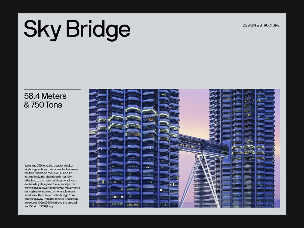 This visual presents a study in structural engineering, showcasing a massive exterior bridge connecting modern skyscrapers. The image emphasizes the scale and precision of the design, highlighting the interplay between complex architecture and functional movement.