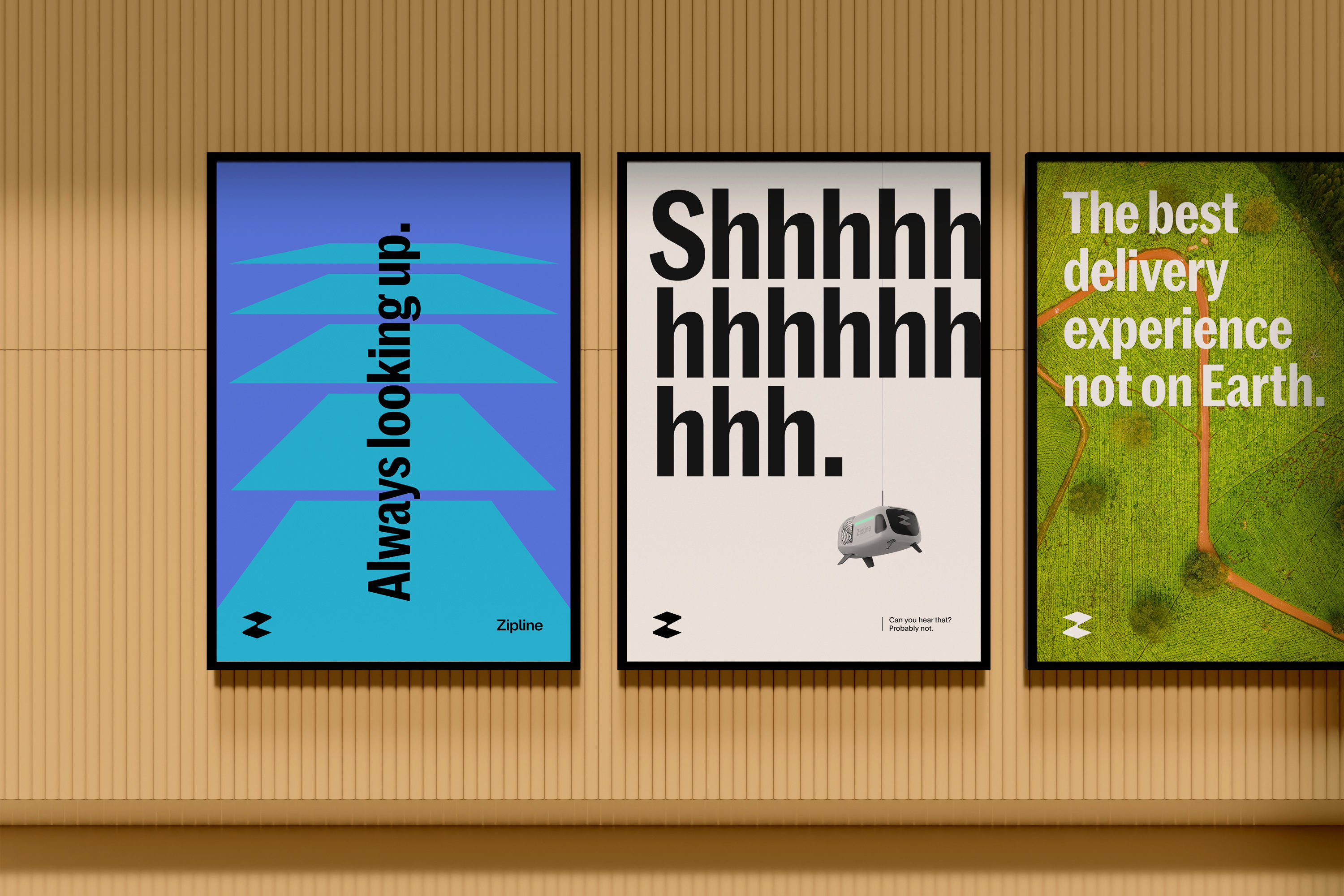 This display uses a minimalist and high-contrast visual language, employing bold typography against saturated background colors to convey themes of adventure and service. The design relies on clean geometric elements and stark text to create immediate, impactful messaging.