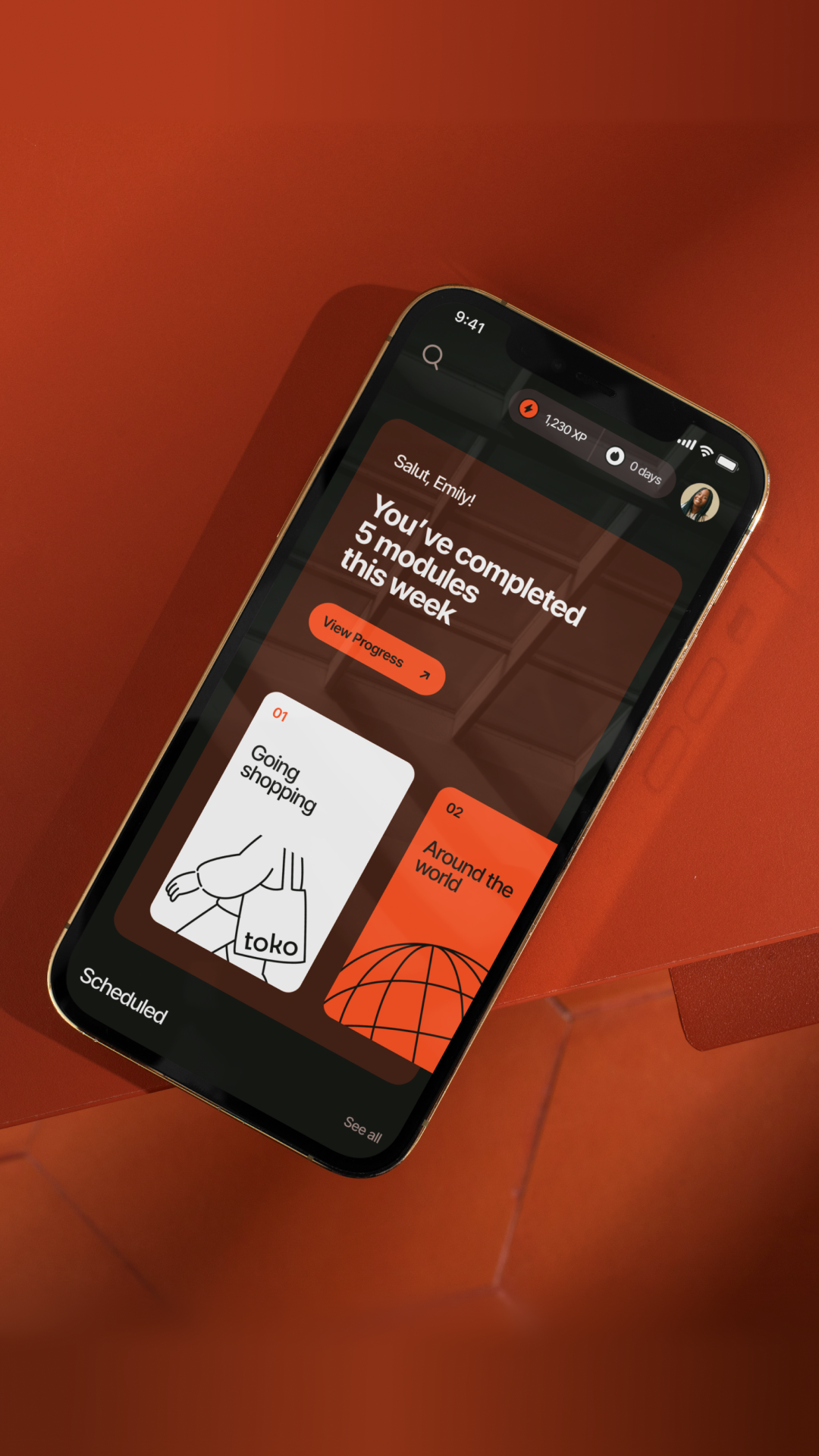 The design utilizes a warm, earthy color palette contrasted with dark mode elements to create a sophisticated and focused user experience. The layout is clean, employing clear hierarchy with strong use of orange accents to highlight progress and key information.