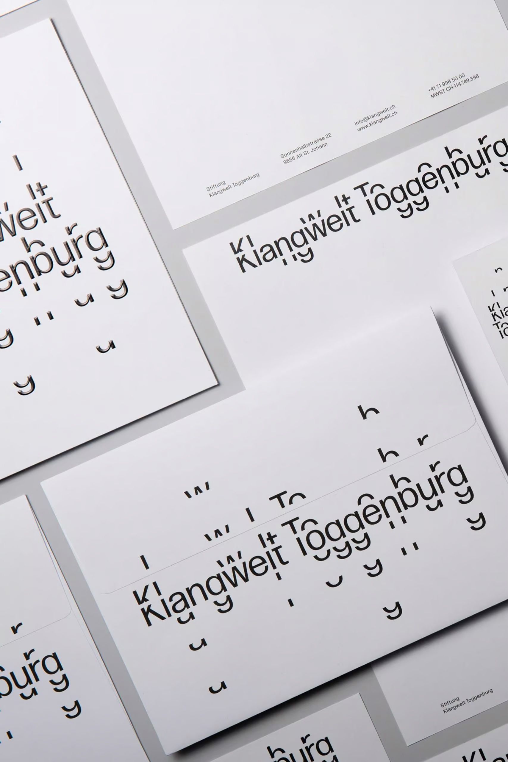 This image displays a minimalist and sophisticated typographic design, likely for branding or stationery. It utilizes negative space effectively to create a clean, modern, and elegant visual hierarchy through the arrangement of text.